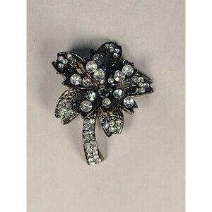 Vintage Bow Style Rhinestone Brooch with Dark Metal Background 1.75 in. Long